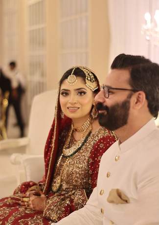 Bride and groom seated