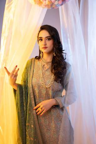 Mehndi look behind sheer curtains