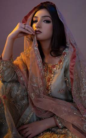 Walima look in sage with a rust dupatta