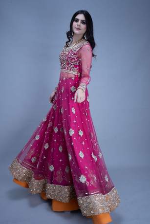 Bride in a fuchsia flared gown