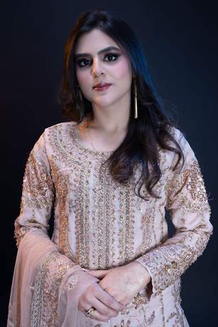Formal portrait in blush and gold