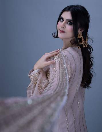 Formal portrait in blush and gold