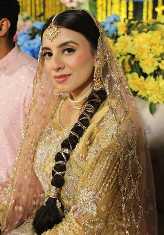 Bride in golden bridal wear