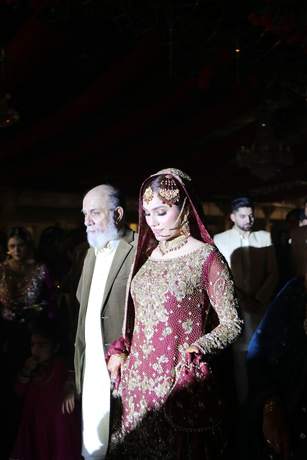 Bride arriving with her father